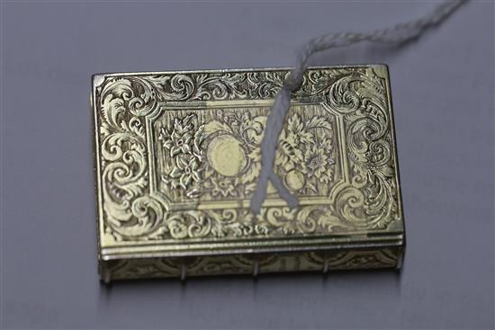 A Victorian silver gilt vinaigrette, modelled as a book, by Rawlings & Summers,